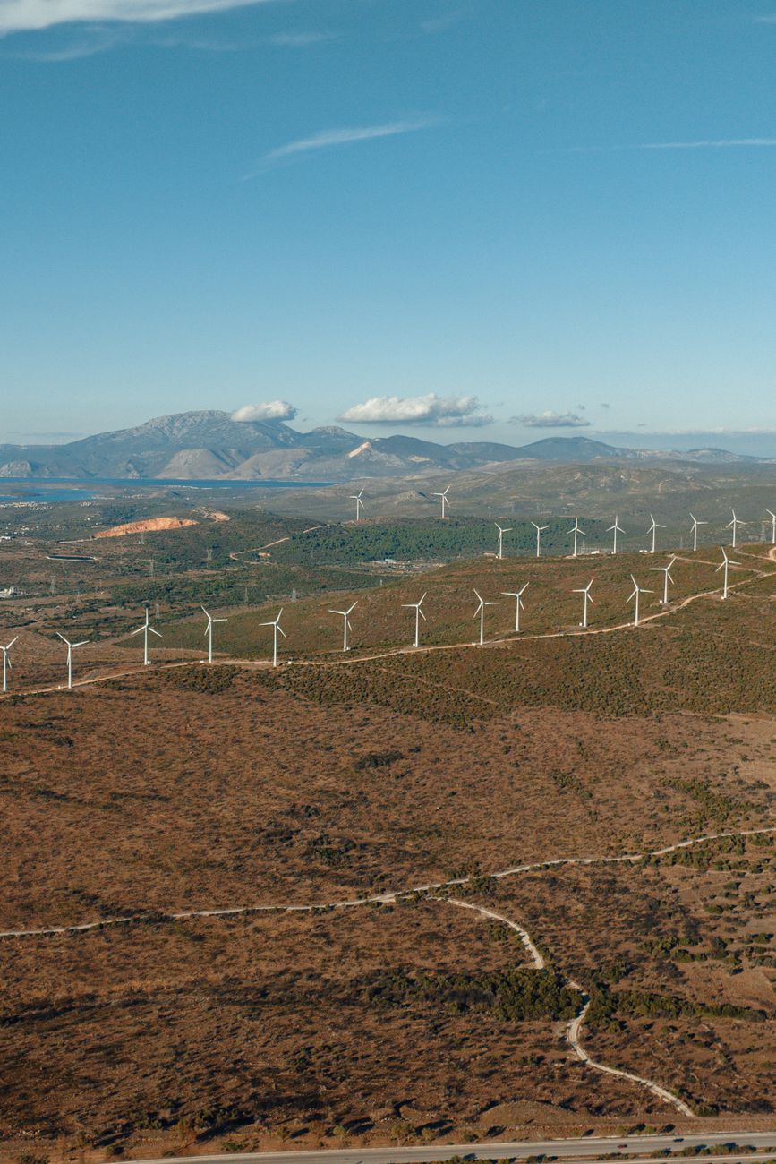 Green landscape with clean energy turbines